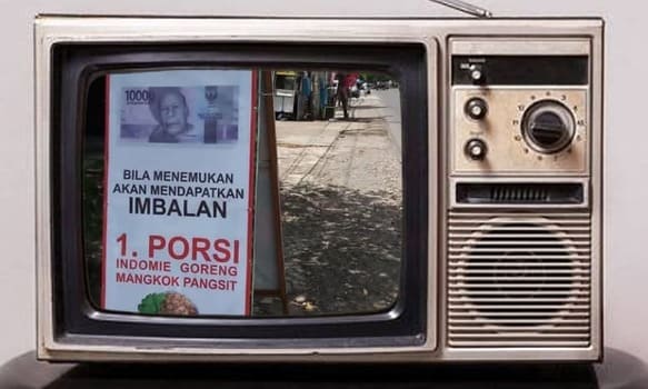 Spanduk promosi pangsit.