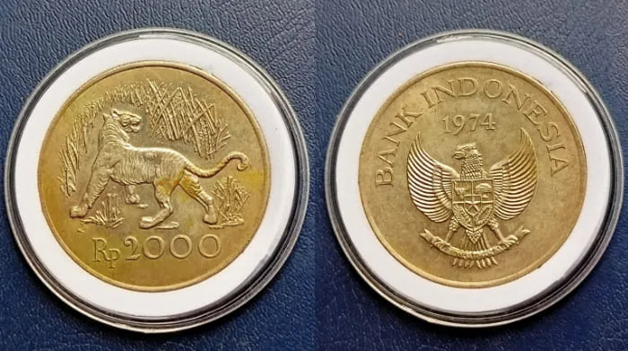 Uang Koin Kuno Bergambar Macan Jawa Pecahan Rp 2000.
